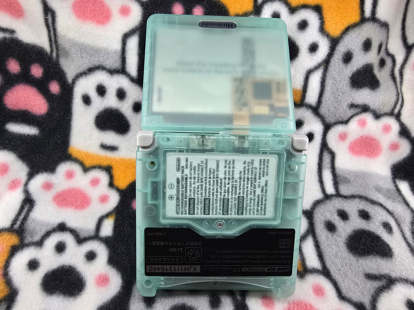 Open Game Boy Advance SP with IPS screen – front view of modded console